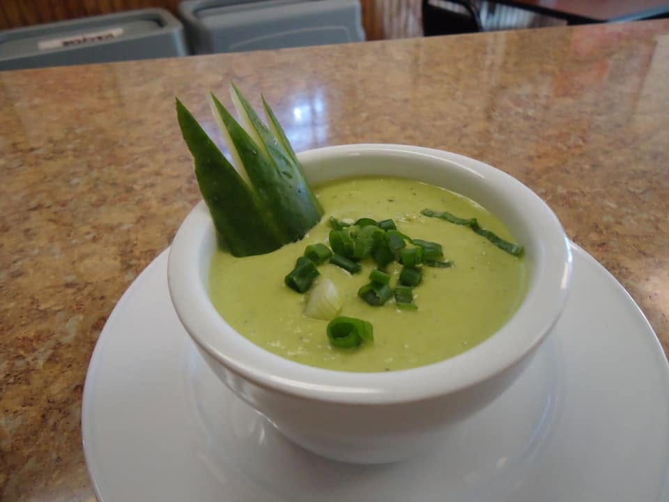 Ají green sauce served in a white bowl