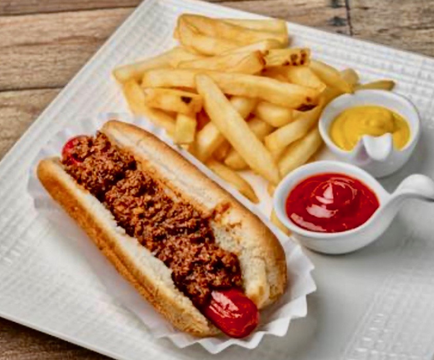 Chili dog served with fries, ketchup and mustard
